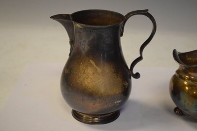 Lot 157 - Silver pot-bellied milk jug, CS Harris, silver cream jug, ashtray, 397g