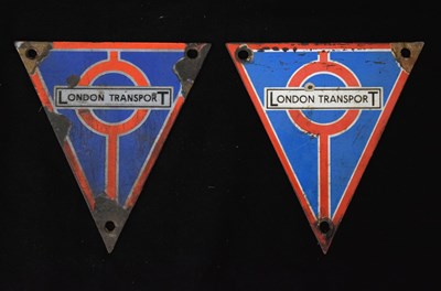 Lot 196 - Two triangular-shaped enamel London Transport bus radiator badges