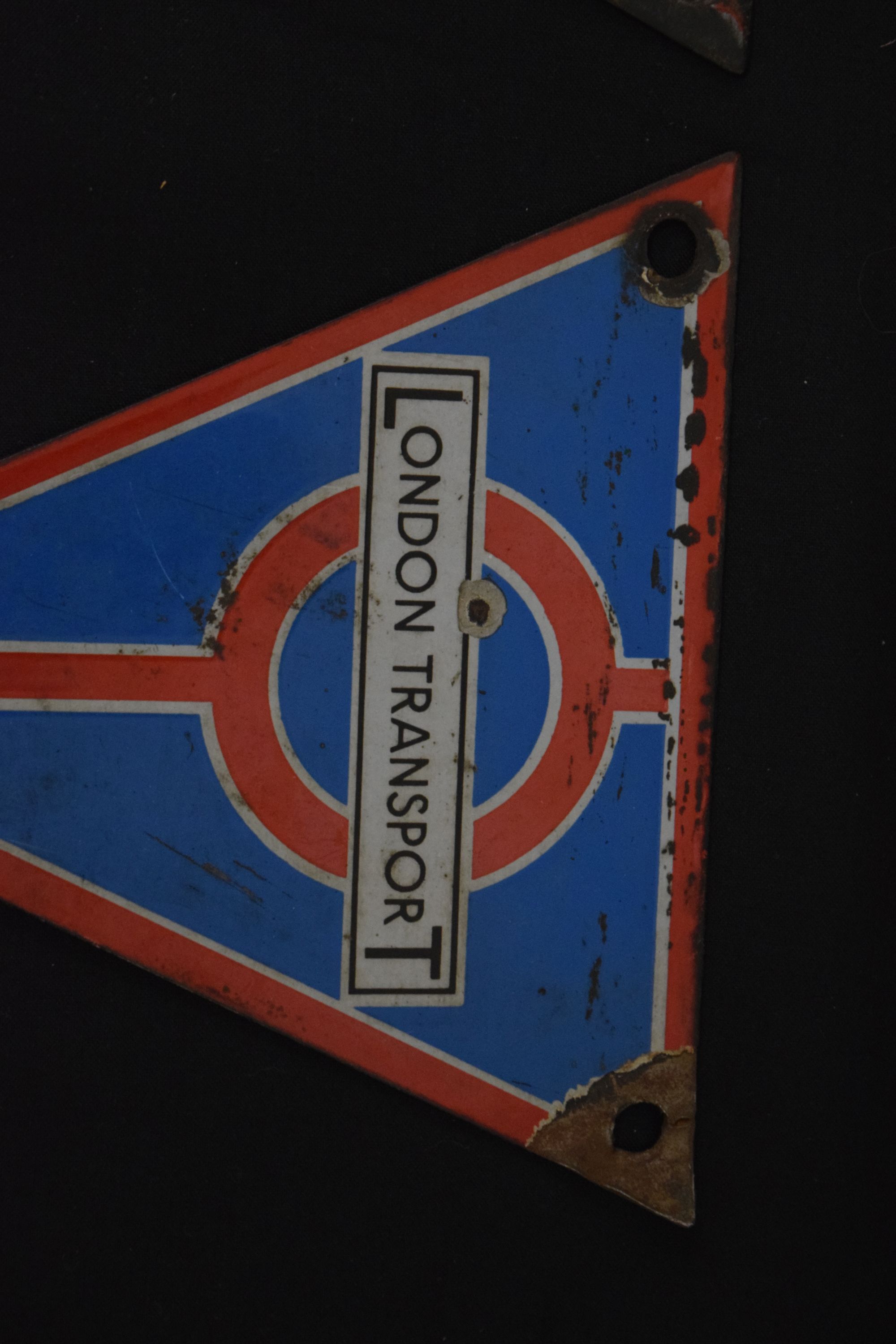 Lot 196 - Two triangular-shaped enamel London
