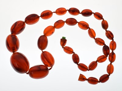 Lot 96 - Graduated amber-style bead necklace