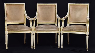 Lot 430 - Group of three 20th century French cream painted and parcel gilt open armchairs