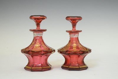 Lot 287 - Pair of cranberry glass perfume bottles