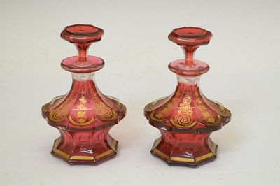 Lot 287 - Pair of cranberry glass perfume bottles