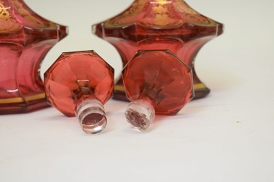 Lot 287 - Pair of cranberry glass perfume bottles