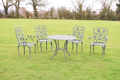 Lot 547 - Five piece green-painted aluminium patio set