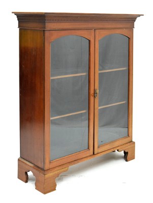 Lot 486 - Early 20th century bookcase with two glazed doors