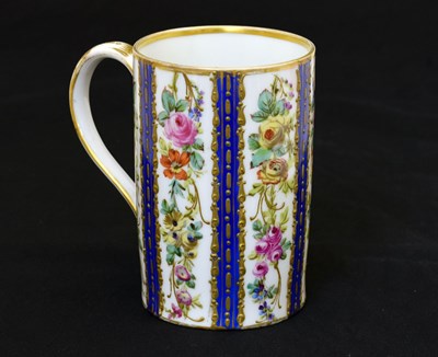 Lot 441 - Sèvres mug with blue and floral panels