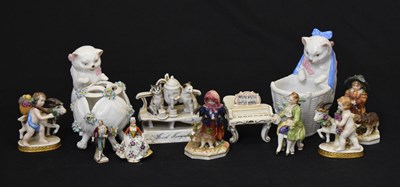 Lot 332 - Quantity of continental ceramics to include kittens, figure groups, etc