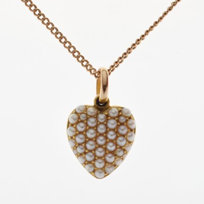 Lot 50 - Yellow metal heart shaped pendant set seed pearls