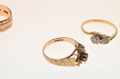 Lot 23 - Four 9ct gold rings, and another