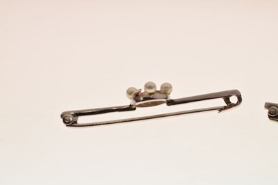 Lot 46 - Two white gold and freshwater pearl set brooches