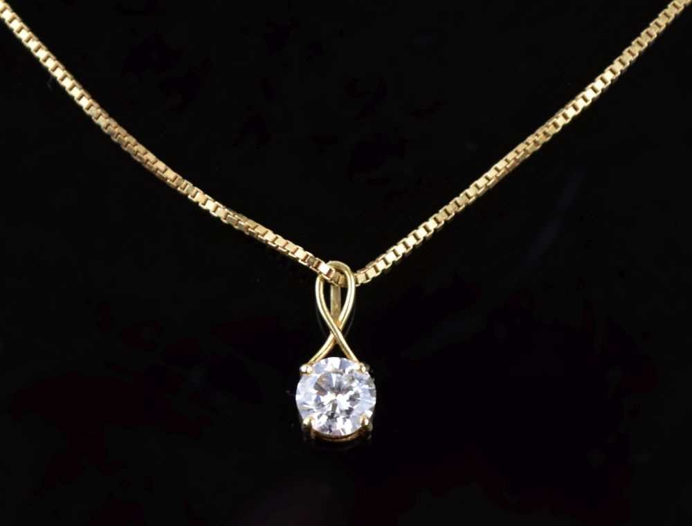 Lot 36 - Single stone diamond pendant on chain