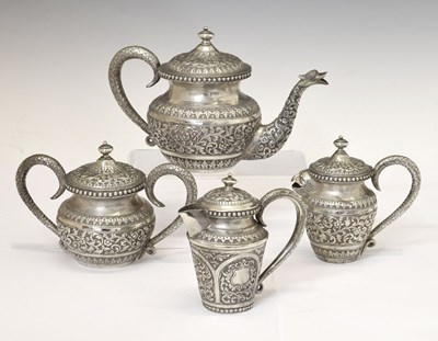 Lot 96 - 20th century South Asian (Cambodian or Malaysian) white metal four-piece tea set