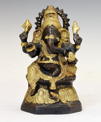 Lot 259 - Indian bronze and parcel gilt figure of Ganesh, the elephant god