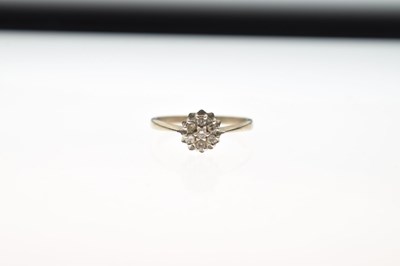 Lot 1 - Diamond cluster ring, the white metal mount stamped '18ct'