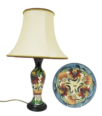 Lot 312 - Moorcroft pottery - Tiger Lily pattern table lamp and 1999 plate