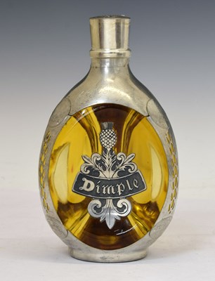 Lot 175 - John Haig Dimple de-luxe Scotch whisky in decorative Royal Holland pewter overlaid bottle