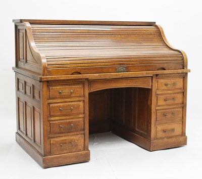 Lot 474 - Late 19th/early 20th century American roll top desk by The Feige Desk Company, Saginaw, Michigan