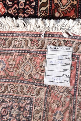Lot 333 - Middle eastern woollen rug, label verso 'Tapis Fait Main' 152cm x 125cm