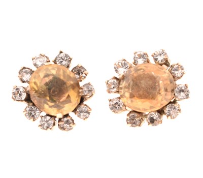 Lot 84 - Pair of unmarked yellow metal, citrine and white stone cluster earrings
