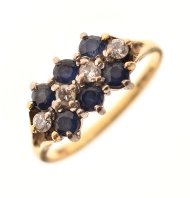 Lot 8 - Sapphire and diamond 18ct gold cluster ring