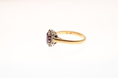 Lot 9 - 18ct gold ruby and diamond cluster ring