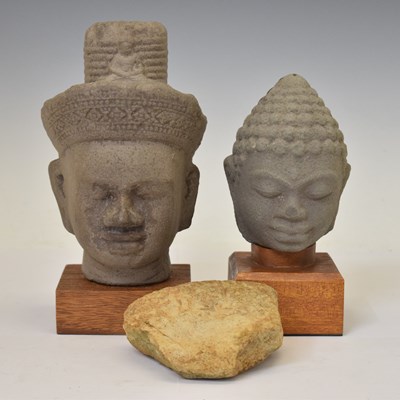 Lot 480 - Two South East Asian grey stone busts and a carved stone fragment