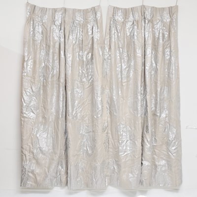 Lot 576 - Three curtains, with silver printed floral design