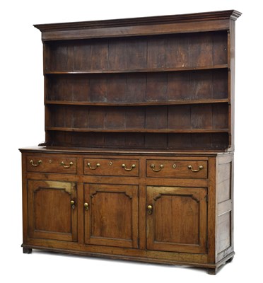 Lot 409 - George III oak dresser and rack