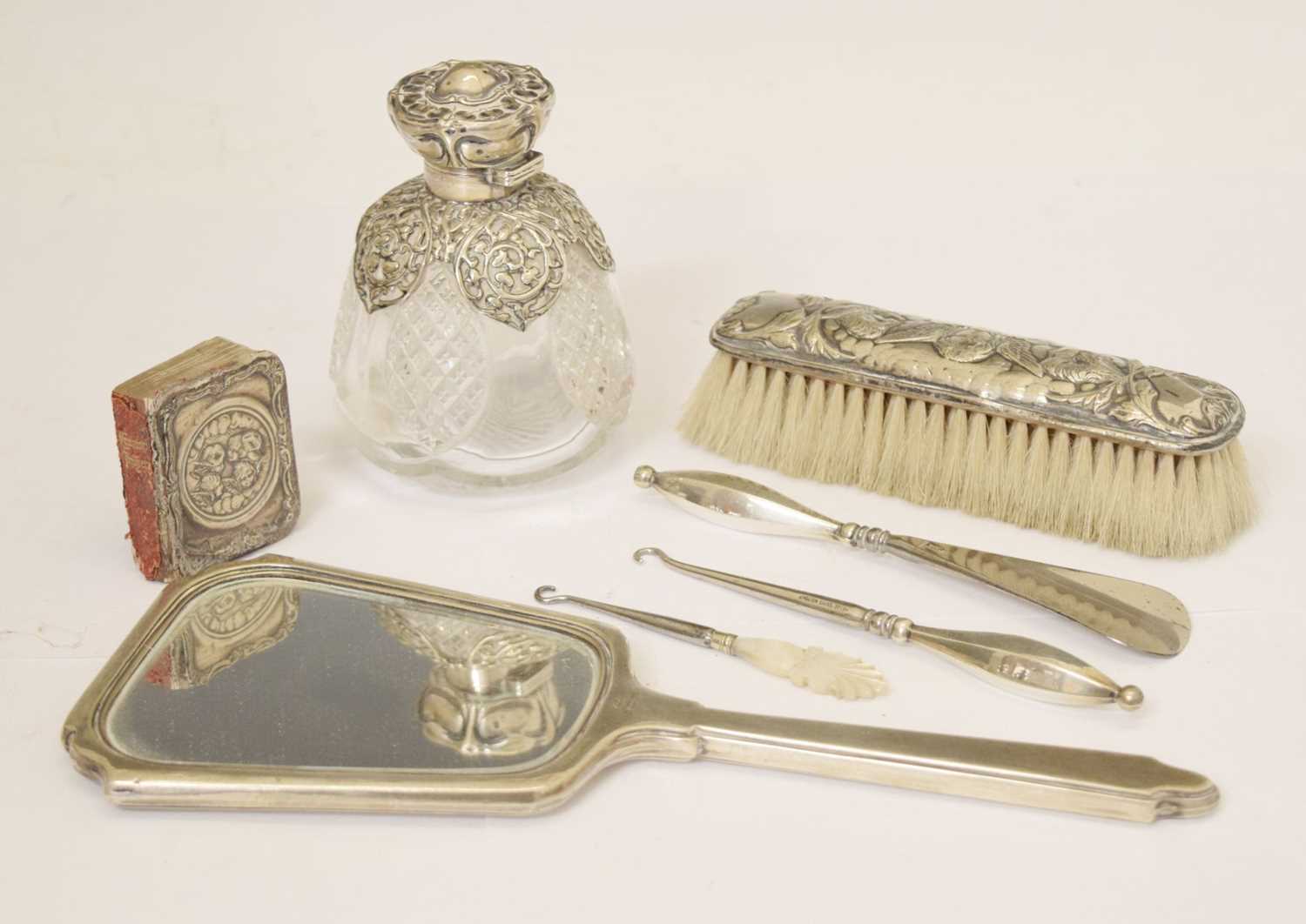 Lot 175 - Edward VII silver mounted perfume bottle, and a quantity of silver handled dressing table items