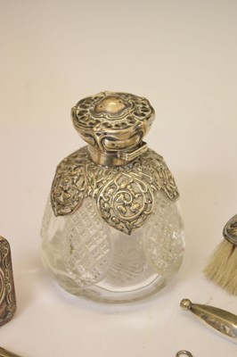 Lot 175 - Edward VII silver mounted perfume bottle, and a quantity of silver handled dressing table items