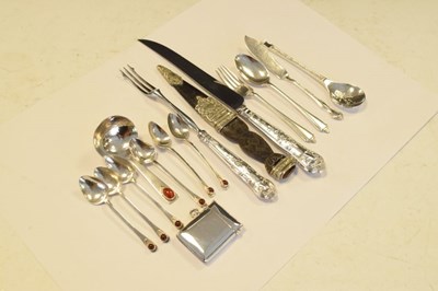 Lot 165 - Set of six Elizabeth II silver teaspoons set cabochon with matching caddy spoon