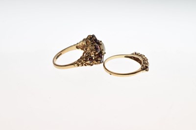 Lot 19 - Two 9ct gold, garnet and opal dress rings