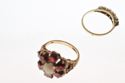 Lot 19 - Two 9ct gold, garnet and opal dress rings