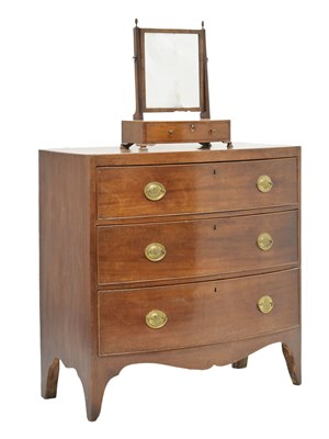 Lot 629 - Regency mahogany bowfront chest of three drawers