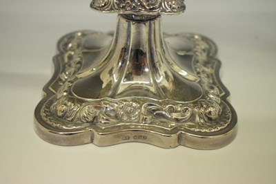 Lot 110 - Pair of Elizabeth II silver three-light, two-branch candelabra