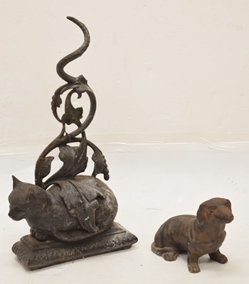 Lot 636 - Two cast iron doorstops