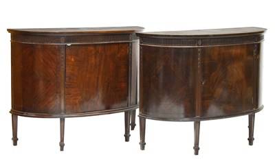 Lot 424 - Pair of 1920s inlaid mahogany demi-lune side cabinets in the Adam Revival taste