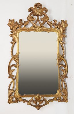 Lot 690 - Large giltwood foliate scroll wall mirror