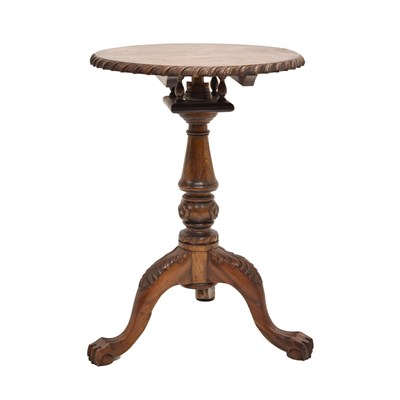 Lot 667 - Old reproduction mahogany tripod wine table