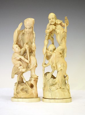 Lot 294 - Two Japanese carved ivory okimono