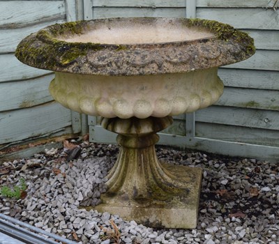 Lot 715 - Composition stone garden pedestal urn with reeded body