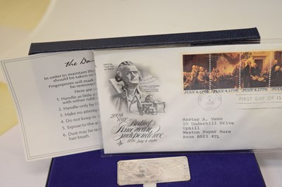 Lot 154 - Three Danbury Mint silver commemorative stamp sets
