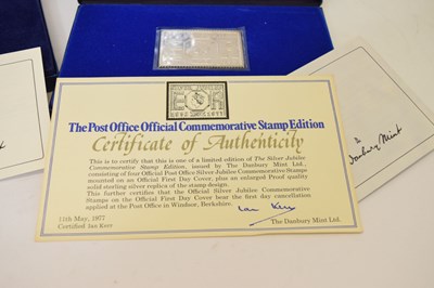 Lot 154 - Three Danbury Mint silver commemorative stamp sets