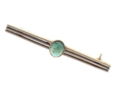 Lot 24 - Early 20th century unmarked yellow and white metal turquoise-set bar brooch