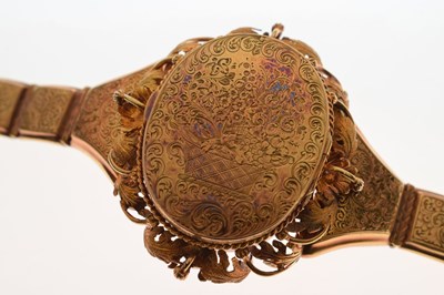 Lot 34 - 19th century yellow metal panel locket bracelet