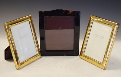 Lot 180 - Pair of Queen Elizabeth II silver-gilt easel photograph frames