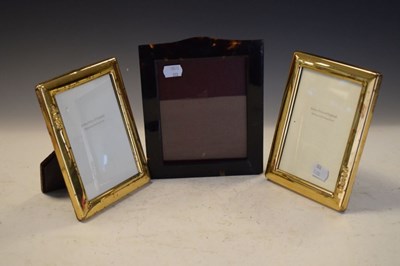 Lot 180 - Pair of Queen Elizabeth II silver-gilt easel photograph frames