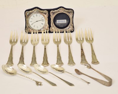 Lot 166 - Set of eight German cake forks, an Elizabeth II silver mounted desk clock and photograph frame, etc