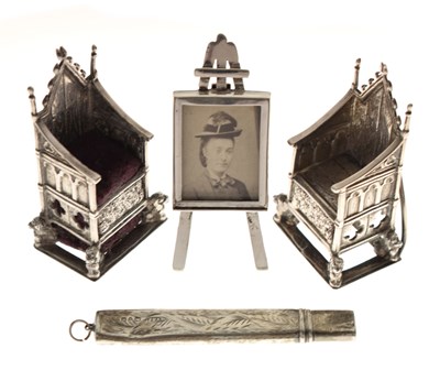 Lot 157 - Two silver Coronation Chairs, an Edward VII miniature silver photograph easel, etc